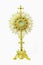 Old gold monstrance on white background