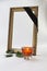 Old gold picture frame with flower and candle