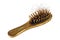 Old golden comb with hairs on the white background