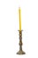 Old golden holder with yellow candle