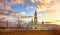 The old-Golutvin monastery Kolomna at sunset with beautiful clouds and Golden light. Bell tower, monastery walls, and