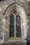 Old gothic arched stone window