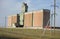 Old grain elevator built in a field working