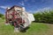 An old grain thresher used as a monument