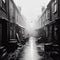 Old grainy black and white photograph of a back street in 1960s Britain