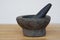 Old granite stone mortar and pestle.