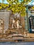 Old grave with a monument to a famous person in the cemetery. Architectural stone statue in the garden