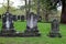 Old gravestones with weathered writing set together in historic cemetery, Saratoga Monument and Victory Woods, New York, 2019