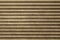 Old gray brown dirty dusty metal wall of the blinds with horizontal lines. rough surface texture