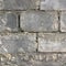 Old gray wall made of cinder blocks. Building abstract background.