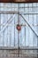 Old gray wooden plank gate with a padlock