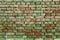 Old green brick wall, rustic texture, design background