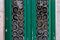 Old Green Door with Metallic Decorative Pattern