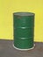 Old green metal barrel