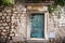 Old green painted doors in Dubrovnik, Croatia