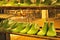 Old green shoe lasts in rows on metal shelves