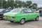 Old green veteran youngtimer sedan car Ford Escort L 1.3