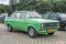 Old green veteran youngtimer sedan car Ford Escort L 1.3