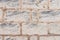 Old grey block shaped stone wall background texture