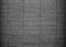 Old and Grey brick wall background. Grunge Concrete wall textured. Stucco gray wall or black wall
