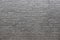 Old grey brick wall background texture