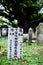Old grey tombstones. Cemetery in Malaysia