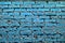 Old grunge cold blue brick wall texture or background