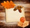 Old grunge paper with autumn oak leaves and Gift box