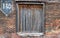 Old grunge wall with wood shutters