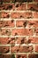 Old grungy background of a brick wall texture