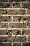 Old grungy background of a brick wall texture