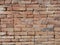 Old grungy handmade brick wall