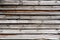 Old grungy and weathered natural wooden planks wall as texture background