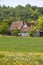 Old half-timbered farm houses with forest and agricultural fields