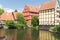 Old half timbered houses reflected in lake