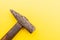 Old Hammer Isolated on a yellow background