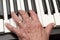 Old Hand on Piano Keys