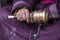 Old hands of a Tibetan woman holding prayer buddhist wheel at a Hemis monastery, Leh district, Ladakh, Jammu and Kashmir, north In