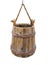 Old hanging wooden bucket isolated