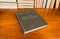 Old hardback english dictionary on a wooden table