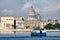 Old Havana seaside buildings with a view of the Capitol