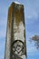 Old headstone with masonic carving