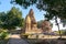 Old Hindu temple, built by Chandela Rajputs, at Western site in India`s Khajuraho framed by trees.