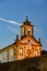 Old and historic 18th century church with its facade illuminated