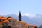 Old Historic buildings and towers in Perast, Montenegro. A beautiful town in Kotor Bay in summer near high mountains. Adriatic Sea