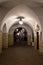 Old historic corridor at night. Arched vault