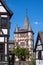 An old historic half-timbered house with small turrets