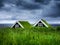 Old historic houses on the field in Iceland. Natural icelandic background. Travelling on Iceland. Famouns place.