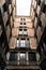 Old historic houses with windows, balconies and streetlight in Barcelona