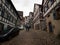 Old historic typical traditional half-timbered house building in cobblestone streets of Schiltach Black Forest Germany